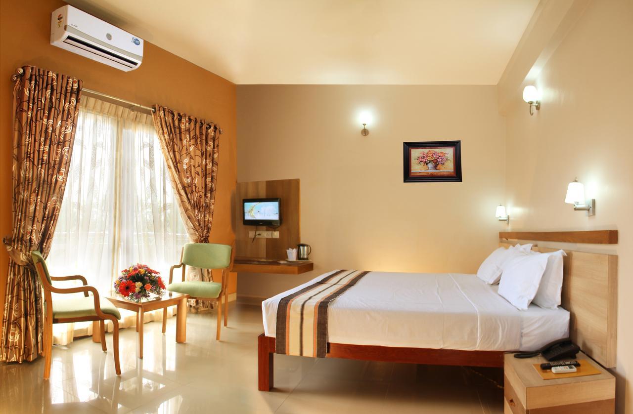 Hotel Polariz Parassinikkadavu Ruang foto